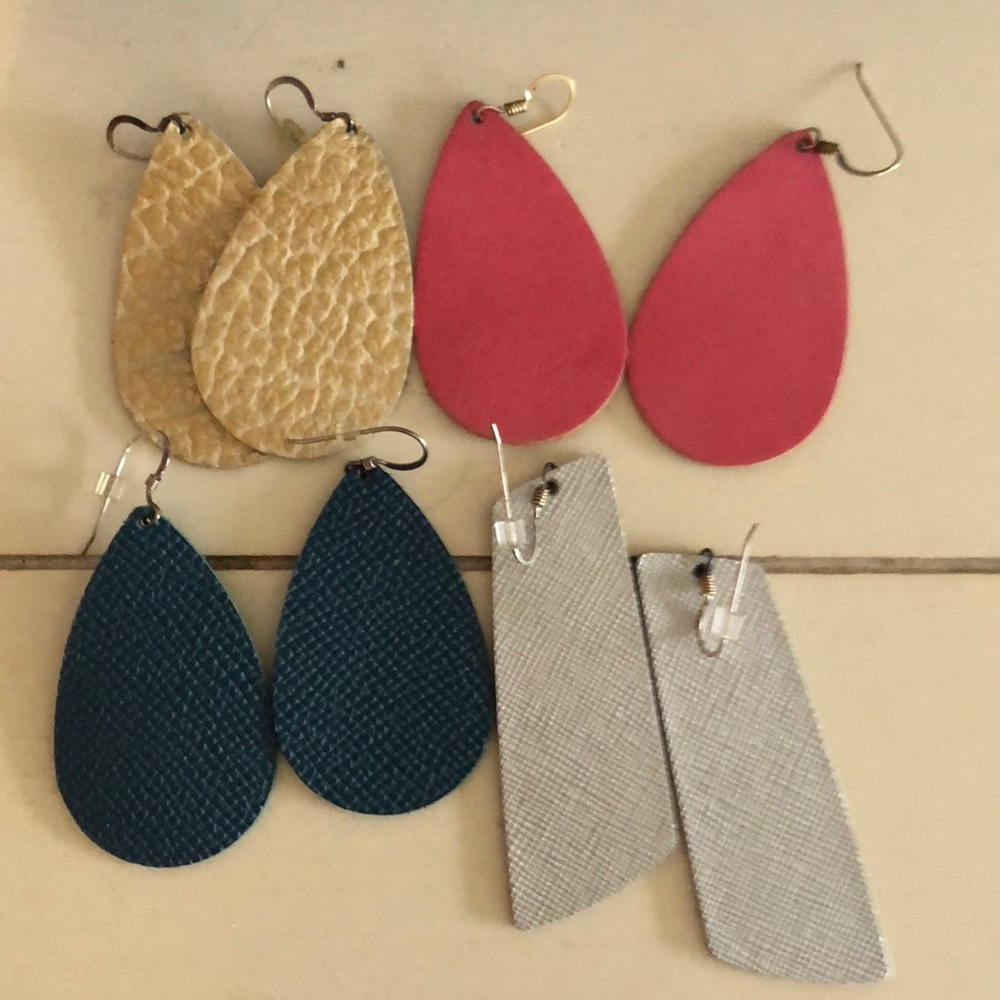 four pair of nickel and suede leather earrings